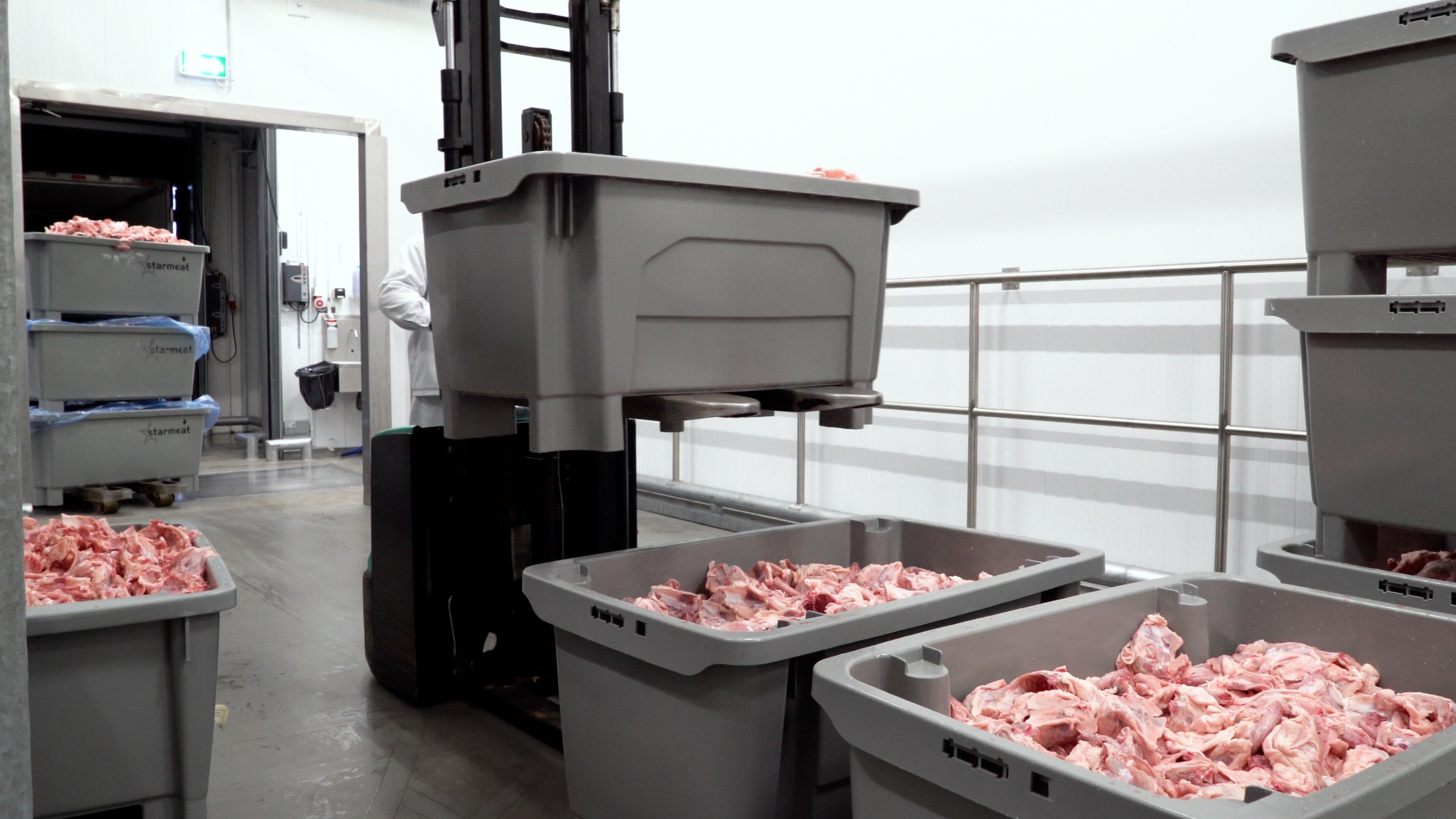 ET Boxes filled with meat on a forklift truck