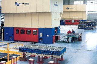 automated forging press in industry hall