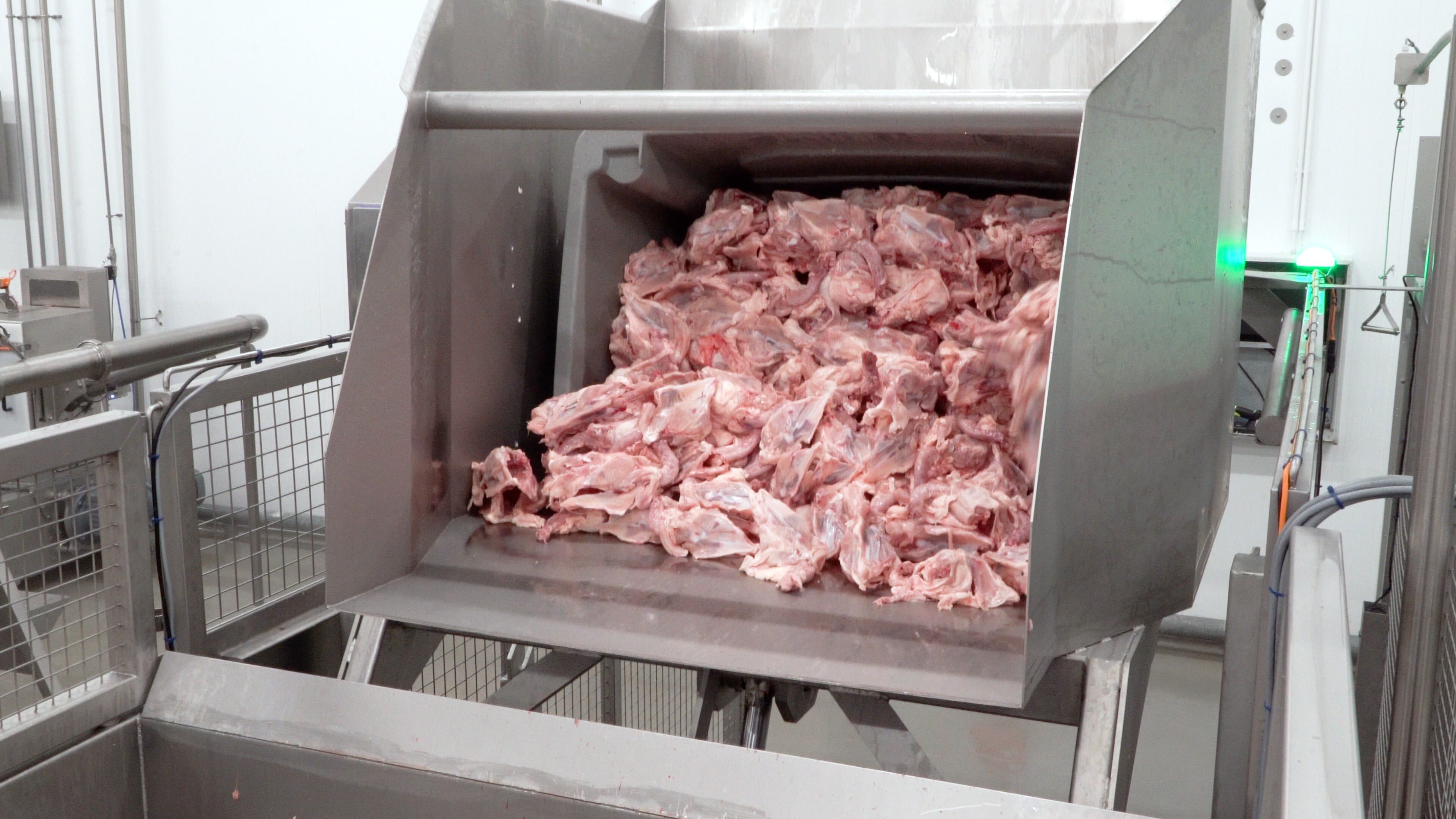 Meat in meat processing machine