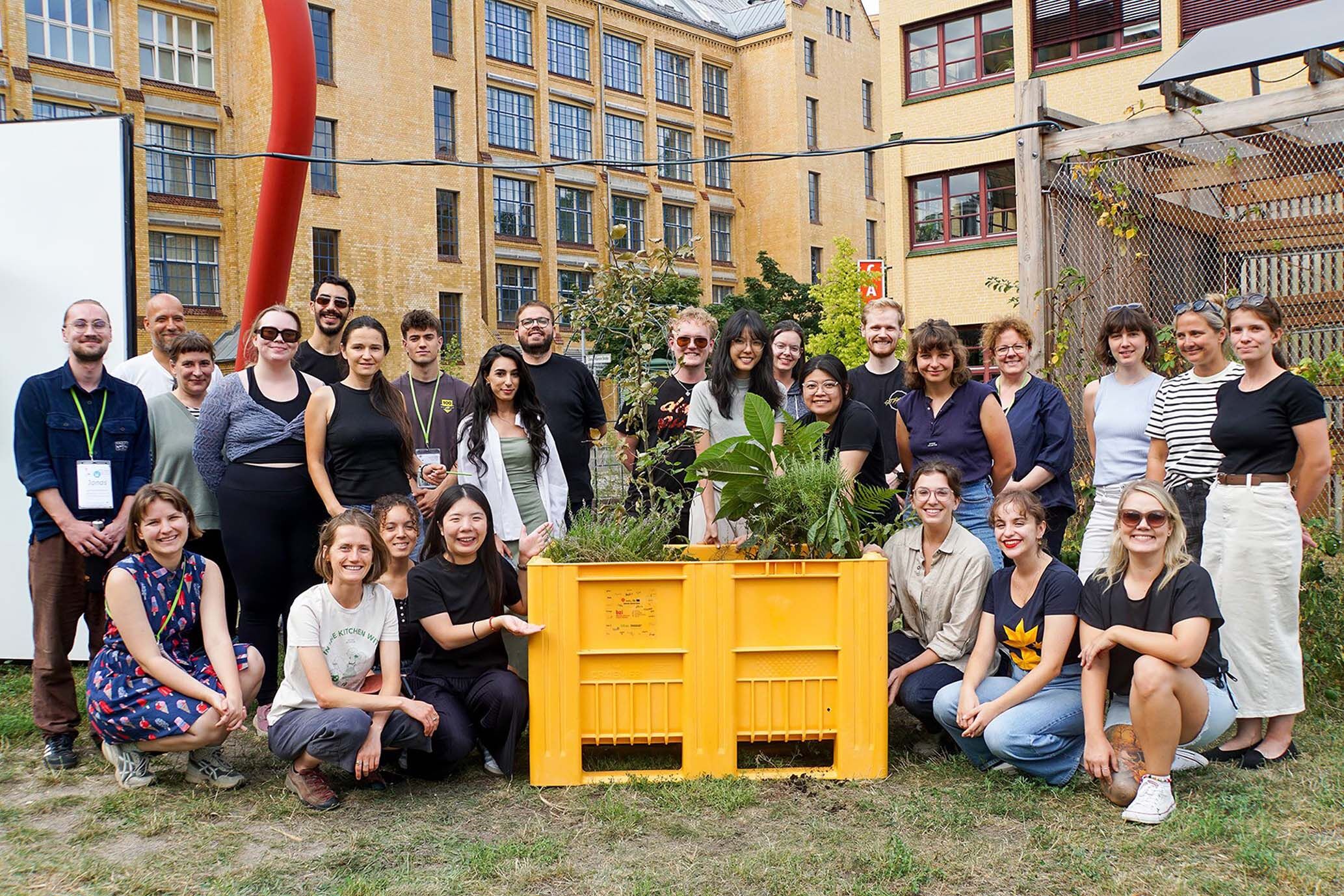 Group photo of International students from the European Industrial Heritage Summer School (ERIH) with planted CB1