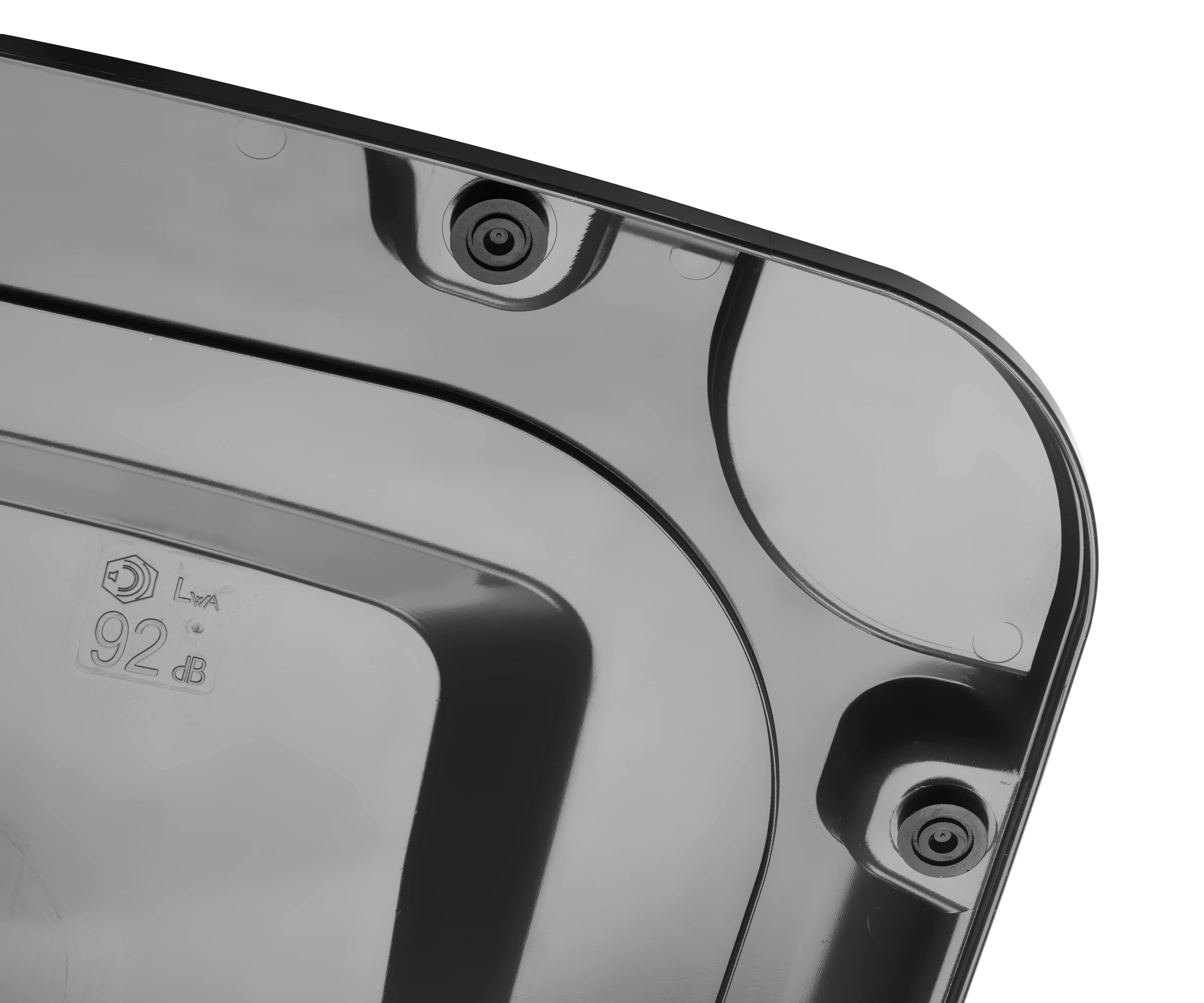 Lid with injected noise isolation plugs