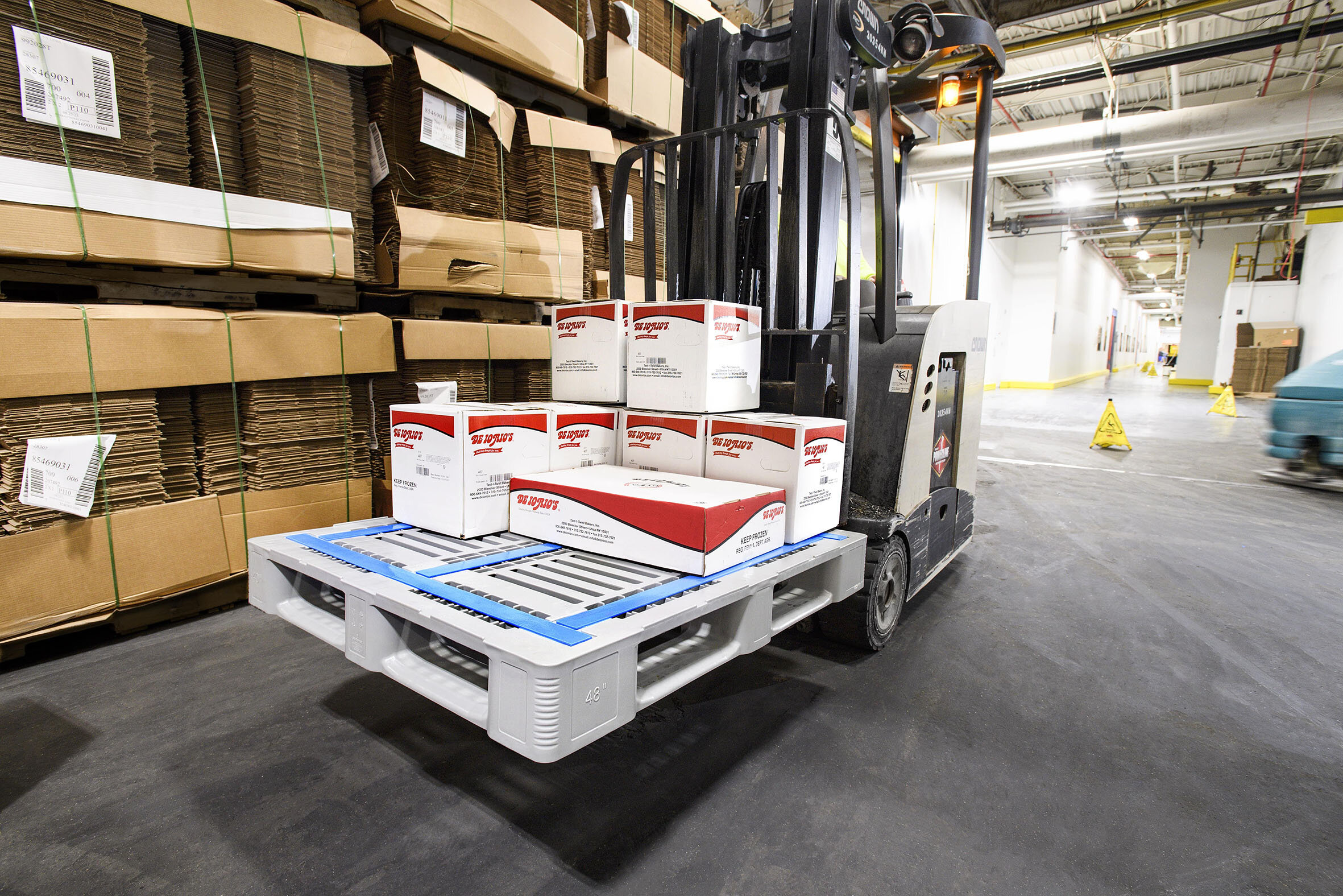 CR4-5 packed with white boxes on forklift truck